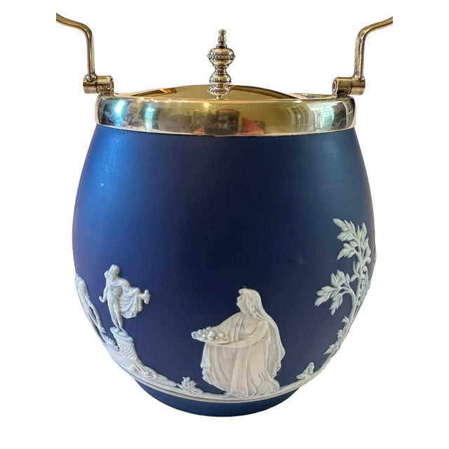 This antique Wedgwood Jasperware ice bucket in cobalt blue and white is a rare find. Beautiful white neoclassical designs...
