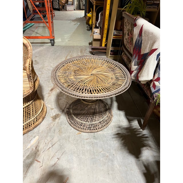 Up for consideration is a beautiful vintage wicker two seater settee and side table. This would look lovely in your home...