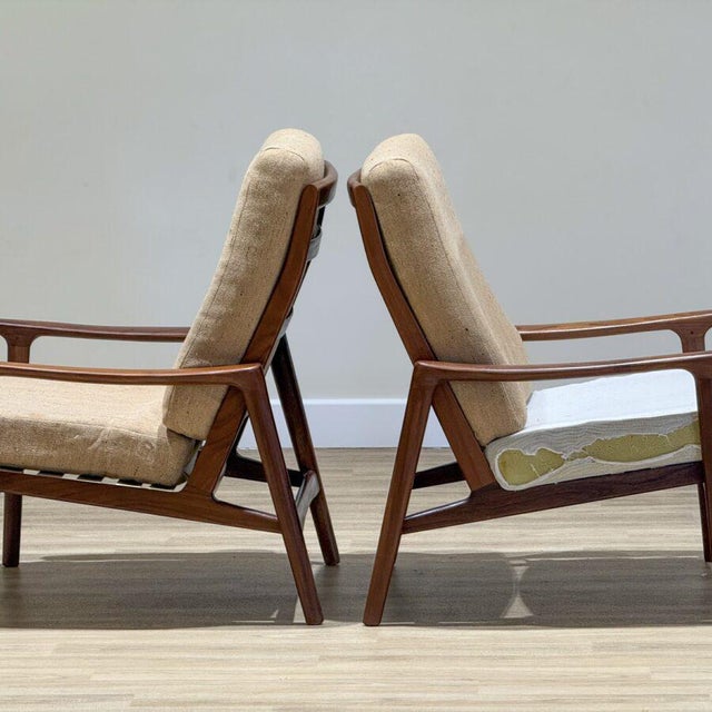 An exceptional pair of vintage 1960s “New Yorker” lounge chairs , designed by George Fejer and Eric Pamphilon for Guy...