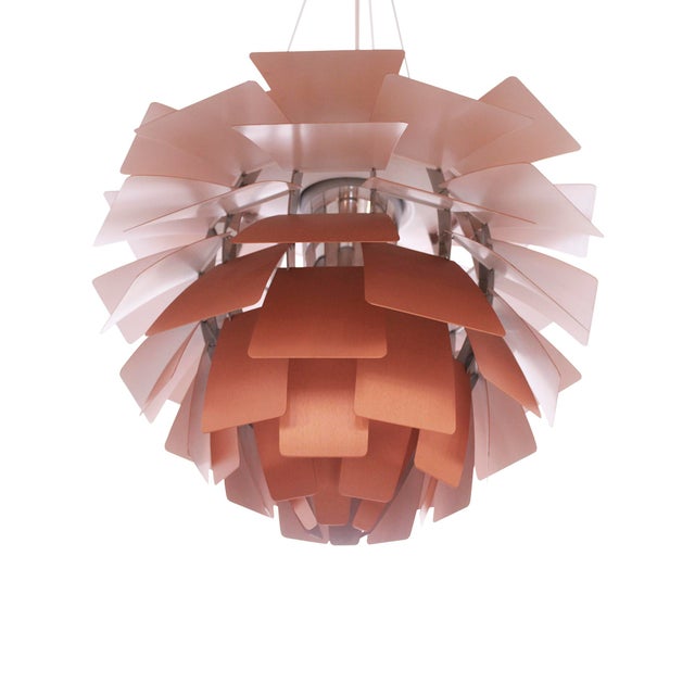 The ph artichoke lamp, designed by poul henningsen for louis poulsen in 1958, is one of the most iconic and recognizable...