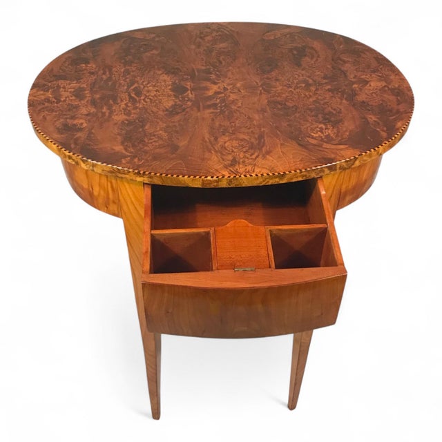 Oval Biedermeier Side Table in Cherry with Root Veneer, Germany circa 1820 This elegant oval Biedermeier side table from...