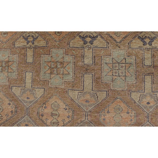 Measures: 4'5 x 8'5 Antique Konya Rug with Soft Sand, Warm Beige, Pale Taupe, and Faded Clay. Keivan Woven Arts /...