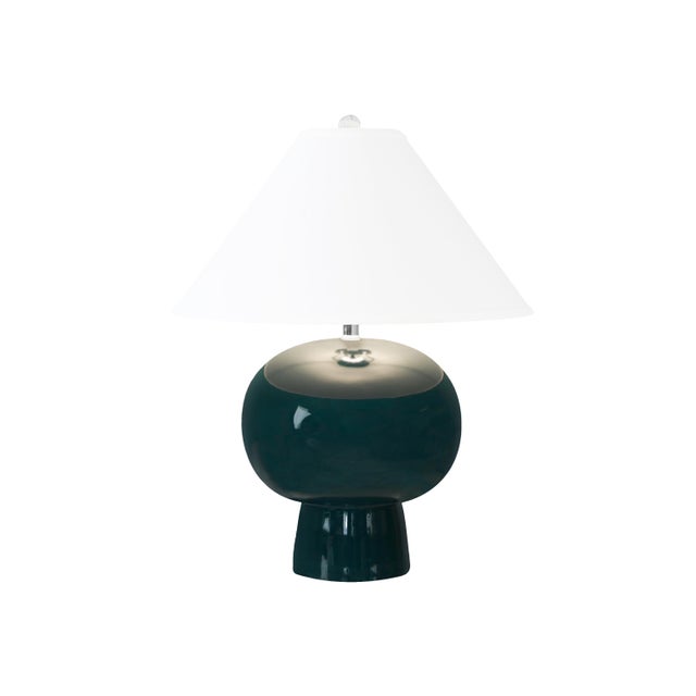 The Annie Teal Glazed Ceramic Lamp A modern take on a classic ceramic table lamp. Beautifully colored in a vibrant Teal...