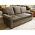 Featuring a casual, transitional design, this piece is upholstered in a dark gray fabric with gently rolled arms and a...