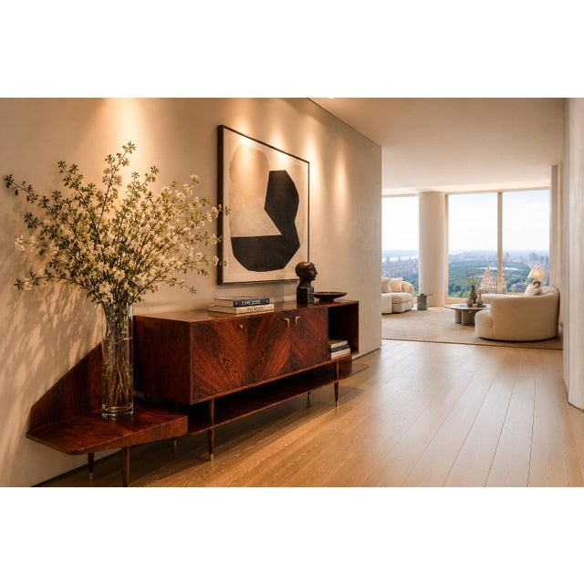 An exceptional credenza by Giuseppe Scapinelli, executed in richly figured Brazilian rosewood during the 1950s. A...
