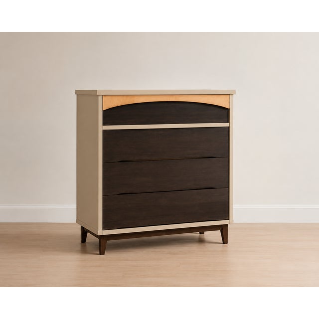 Beautifully refinished mid-century modern four-drawer chest featuring a timeless two-tone design. The cabinet has been...