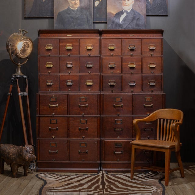 ABOUT Two available. Price is per piece. Antique monumental mahogany and maple file cabinet by Yawman & Erbe,...