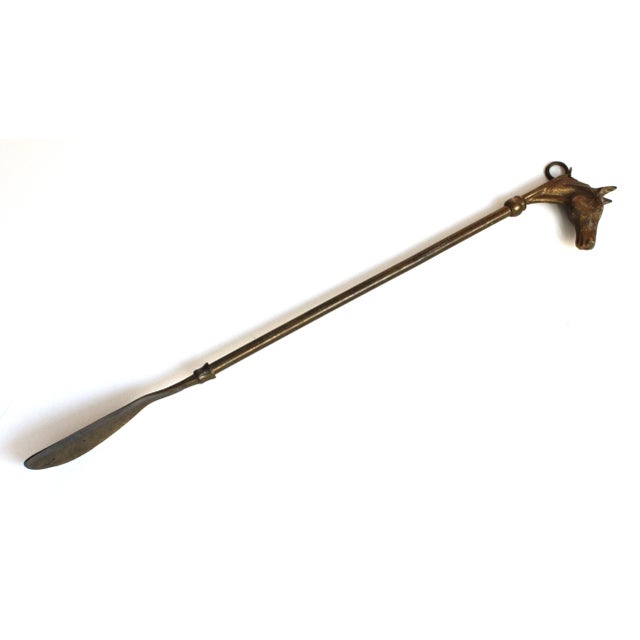 Traditional English un-lacquered brass shoe horn with a stylishly unique horse head handle. A longer shoe horn is much...