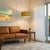 Crafted with satin nickel and a turquoise linen shade, the Stretch Swag Kit is a modern lighting solution by the NOVA...
