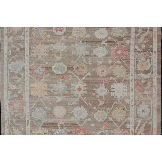 Textile Turkish Oushak Rug With All-Over Floral Design on a Light Brown Field For Sale - Image 7 of 12