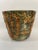 An enchanting earthenware jardiniere or cachepot made by the Weller Art Pottery Company. Circa 1920s. This lovely piece...