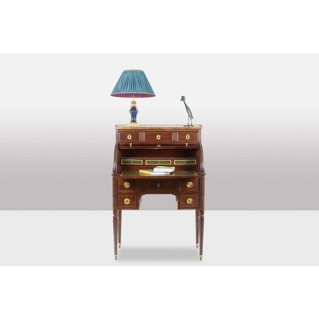 Desk, or secretary, with cylinder, in mahogany. French work from the late 18th century. Handles, locks and sabots in...