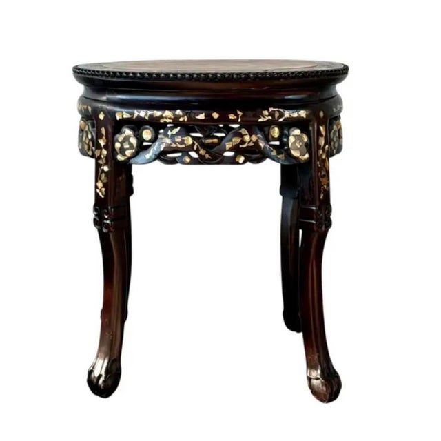 Chinese Rosewood Plant Stand. Stand features an oval insert marble top with a beaded edge that provides both visual...