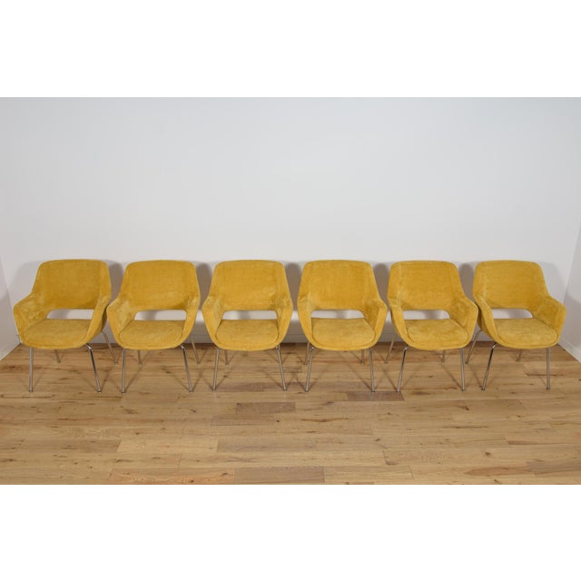 Set of 6 armchairs Model "Kilta" designed by the Finnish interior designer Olli Mannermaa. The armchairs was produced by...