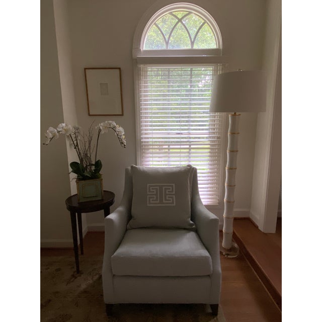 An ivory applique´ greek key design adorns the front of this gray cotton linen pillow by Ryan Studio. It is trimmed with...