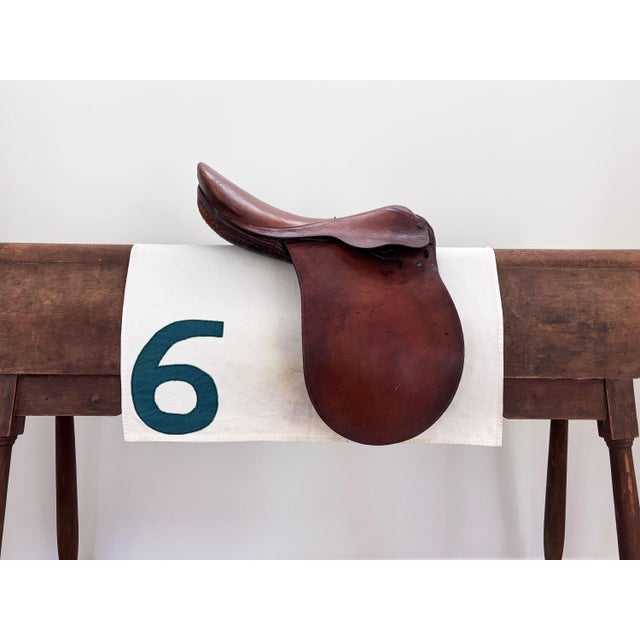 Here is a vintage racehorse saddle cloth (saddle pad) circa 1960s. The off-white saddle cloth is made of canvas and...