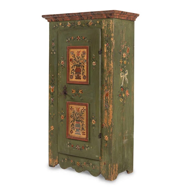 Authentic Bavarian folk art armoire handcrafted in softwood with its original sage green painted finish and richly...
