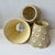 Set of three fabric Empire-style lampshades featuring a William Morris inspired willow and thistle design. Interior metal...