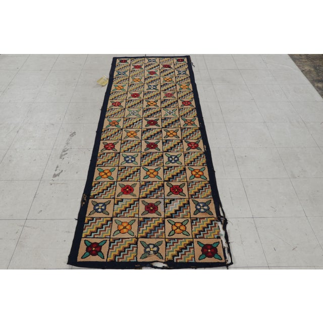 Handmade in wool and originating circa 1920-1930, this 3x8 rug is a rare and exciting new curation in Rug & Kilim’s...