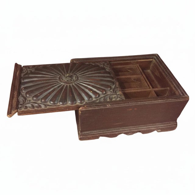 Dimensions: 11" W x 8" D x 5" H This vintage, hand carved box with a sliding lid comes from India. Cash Boxes or merchant...