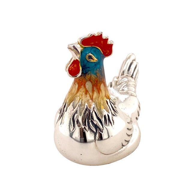 A fun and finely executed sterling silver and enamel figurine or paperweight in the form of a rooster. The piece is solid...