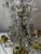 Superb pair of Louis XVI style girandoles/candelabra in gilt bronze and cut crystal. These elegant pieces feature a finely...