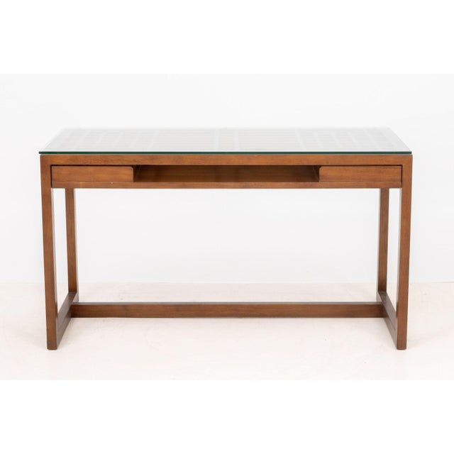 Maria Yee "Metro" Chestnut Writing Table, with glass top and slide drawer with multiple compartments. 30.25" H x 54" W x...