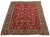 This vintage Persian Tabriz Hand-knotted wool rug has a red field with multicolor accents in allover scattered sprays of...