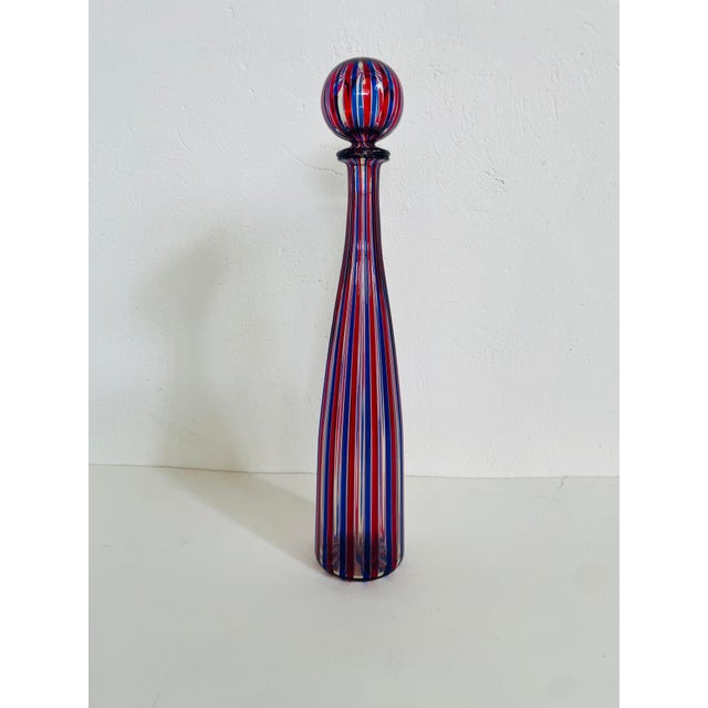 This elegant and refined 1989 Murano glass bottle by Venini is inspired by the paintings of Giorgio Morandi. Designed in...
