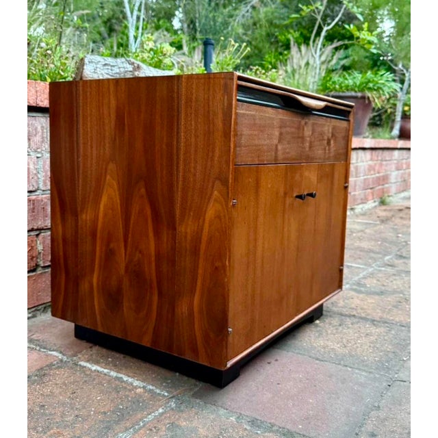 Mid-Century Modern walnut nightstand designed by John Kapel for Glenn of California DIMENSIONS Height: 23 in (58.42 cm)...