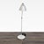 This Artemide floor lamp features a sleek chrome finish and adjustable arm, perfect for focused task lighting. The sturdy...