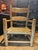 This antique child’s ladder-back chair, dating from the mid-19th to early 20th century, showcases a classic Shaker-...