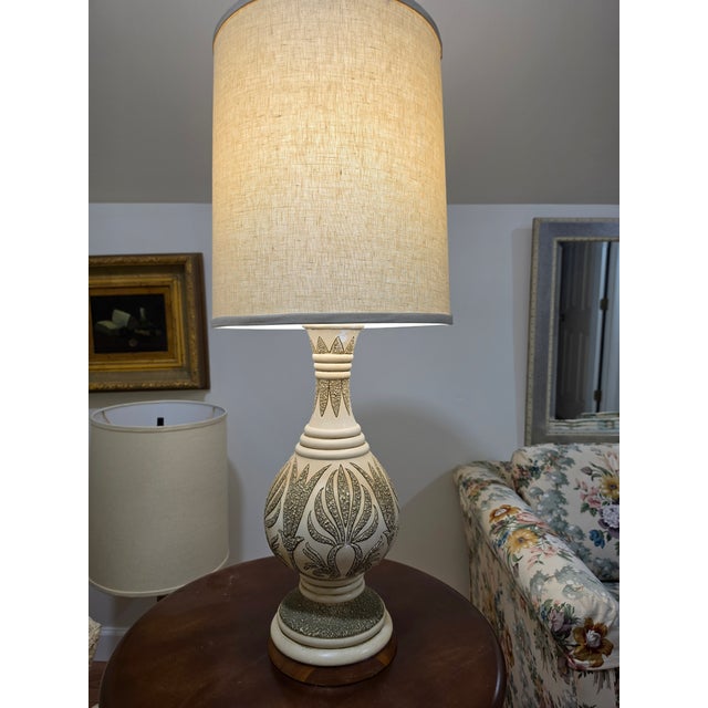 Illuminate your space with a captivating blend of exotic flair and mid-century sophistication with this stunning set of...