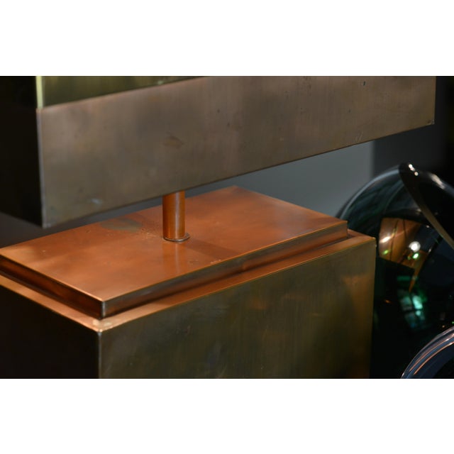 This lamp was manufactured in France in the early 1970s. The base is made of copper-coated wood, while the lampshade is...