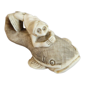 Japanese Bone Netsuke of Kappa Riding a Catfish, Meiji Period