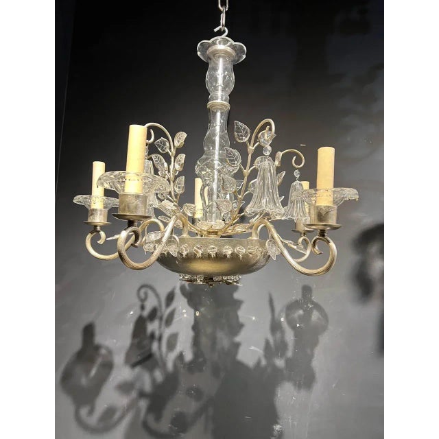 A circa 1930’s French Bagues chandelier silvered leaf finish with interior lights