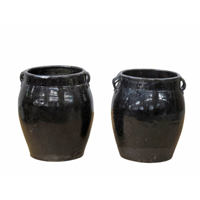 This set of 2 hand glazed flower pottery is perfect for a group small plants or fresh cut flowers in your kitchen, dining...