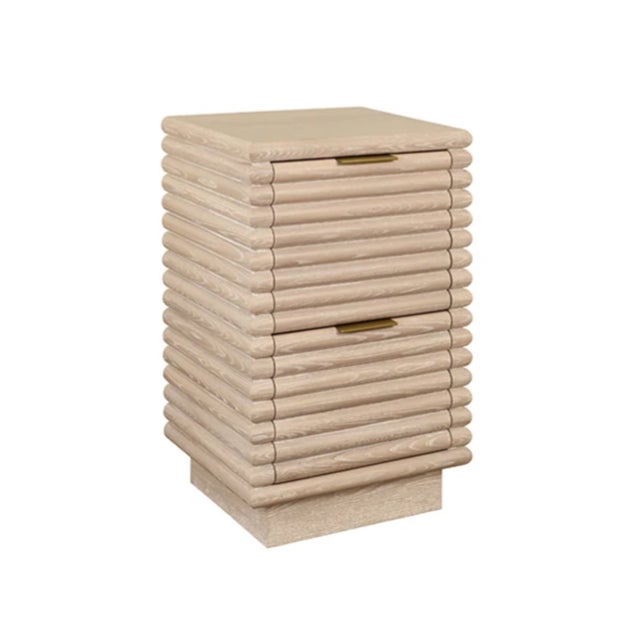 New special order item. Not vintage. Elevate your space with the Nayla Cerused Oak Reed Side Table, a sophisticated blend...