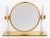 Karl Springer Vanity Mirror, 1970s, chrome-plated steel and gold-tone brass. 15.25" H x 21" W x 5" D. Provenance: From a...