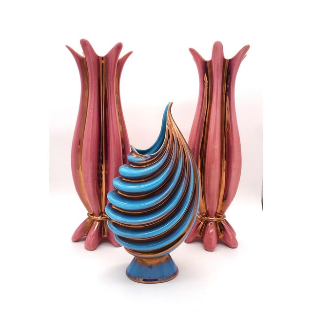 Pink vases are 40 cm in height diameter 12 cm Blue one is 29.5 cm in height and diameter 14 cm This piece has an...