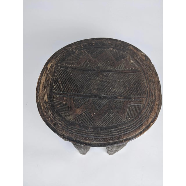 Traditional Nupe stool from early 20th C. Most Nupe art is abstract without any images of people and/or animals, which...