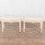 Pair of early 20th century Swedish taboret stools crafted in pine. Each stool features turned, tapered, fluted legs and...