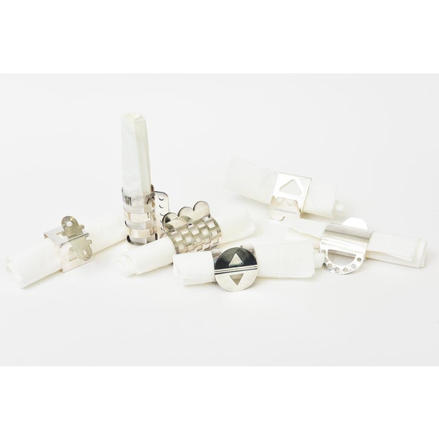 This set o fantastic sculptural Memphis style silver plate napkin rings designed by Nathalie Du Pasquier and Ajumi Hans...