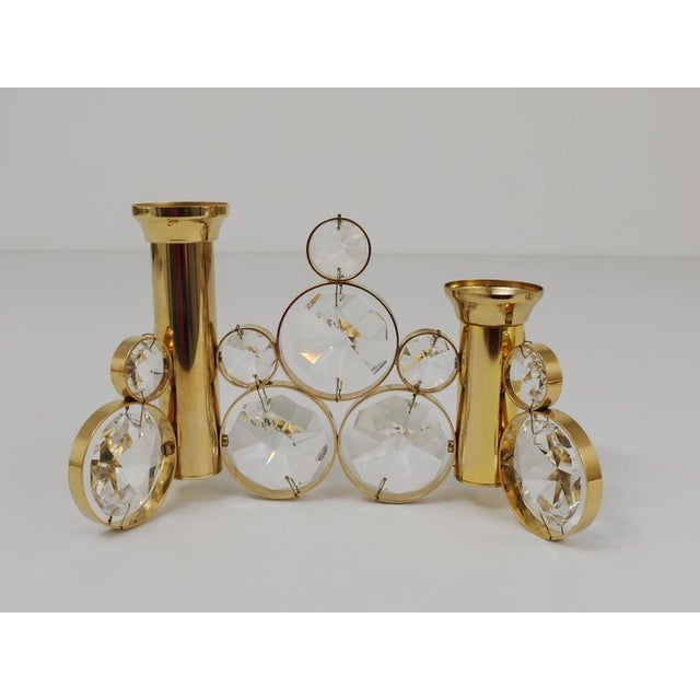 A beautiful candle holder in the style of Gaetano Sciolari. Manufactured in the 1970s by Palwa Germany. Made of gold-...