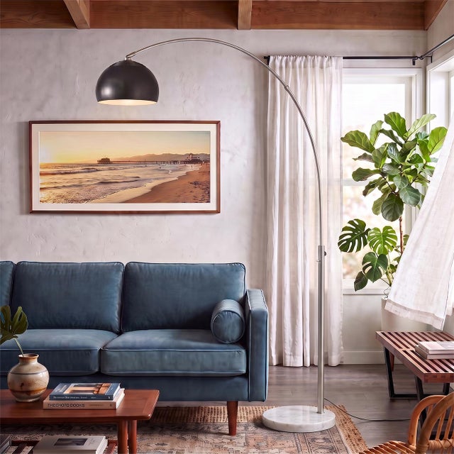 Searching for a sculptural arc floor lamp with a modern metallic finish? The Half Dome Arc Lamp arches 92" tall in...