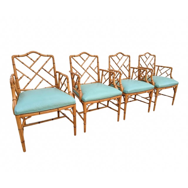 A handsome set of four faux bamboo dining armchairs by Century Furniture inspired by the timeless elegance of Chinese...