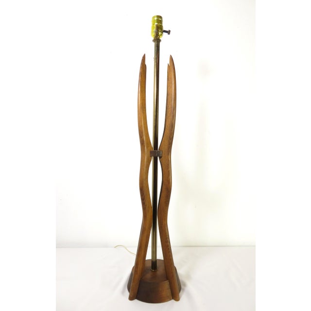 Nice, true vintage, mid century modern sculptural walnut table lamp. The wood is in overall great shape with maybe the...