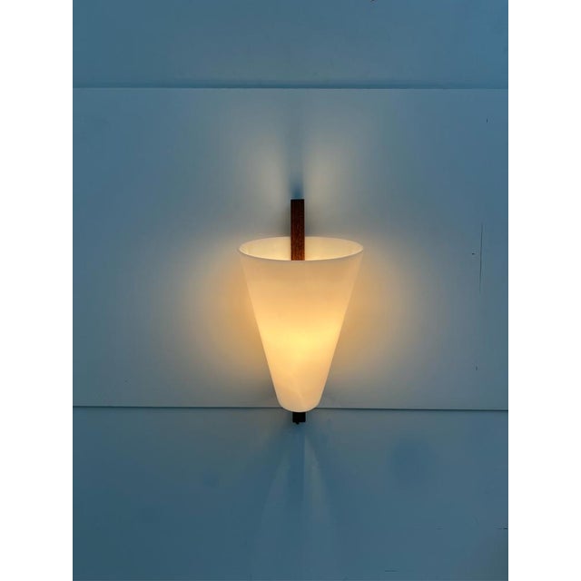 teak and acrylic wall lamps designed by Hans-Agne Jakobsson in the 1950s and produced by his company AB Markaryd, Sweden....