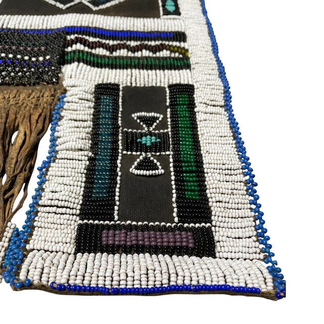 This gorgeous piece comes from the Ndebele of South Africa. A women’s apron, specifically a Mapoto, for a newly wed. The...
