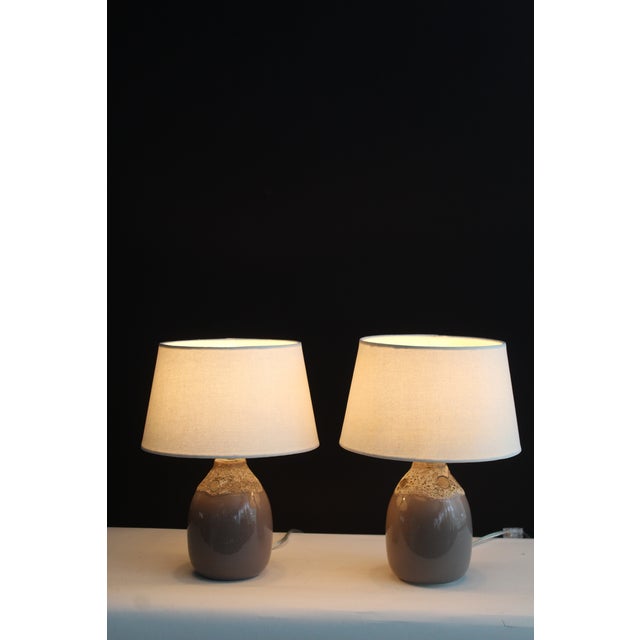 A petite pair of Lee Rosen influence Ceramic lamps. Rich greige color with an lava overlay. Adding depth and texture to...